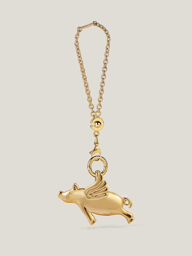 Luxury Brass Fliggy Bag Charm  - Luxury Bags Hermes recension och pris